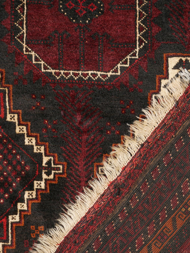 Vintage wool rug · Baluch · Burgundy & charcoal