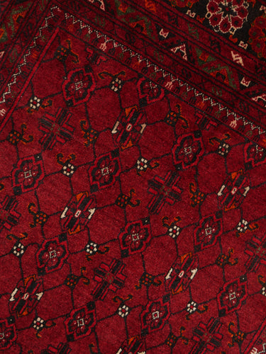 Vintage wool rug · Turkmen · Crimson red & navy